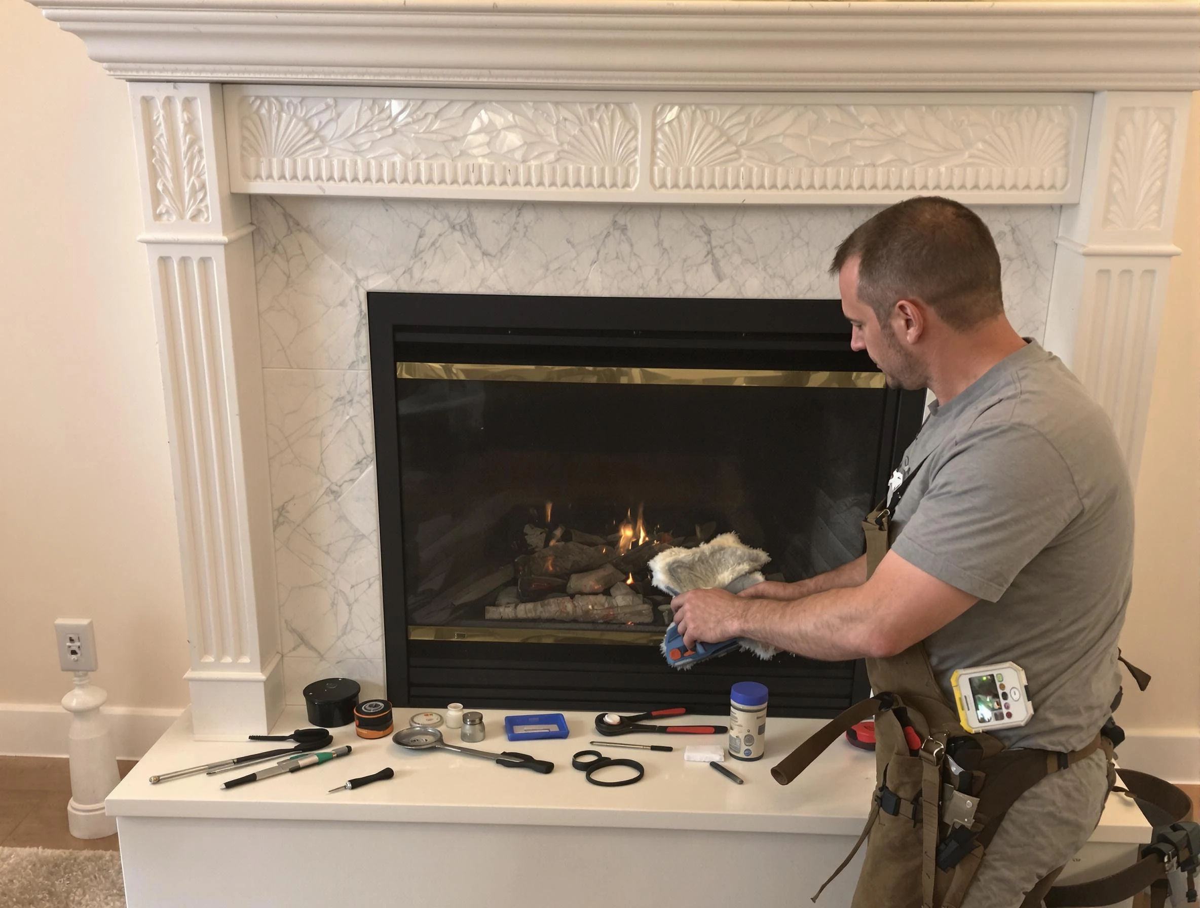 Greenwood Village Chimney Sweep performing fireplace maintenance in Greenwood Village, CO